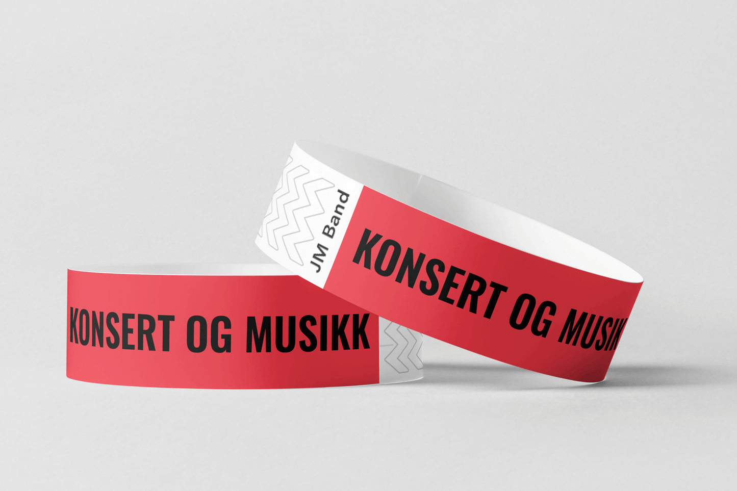 To Papirarmbånd med trykk Via eMail med ordene konsert og musikalsk musikk, fra JM Band NO.