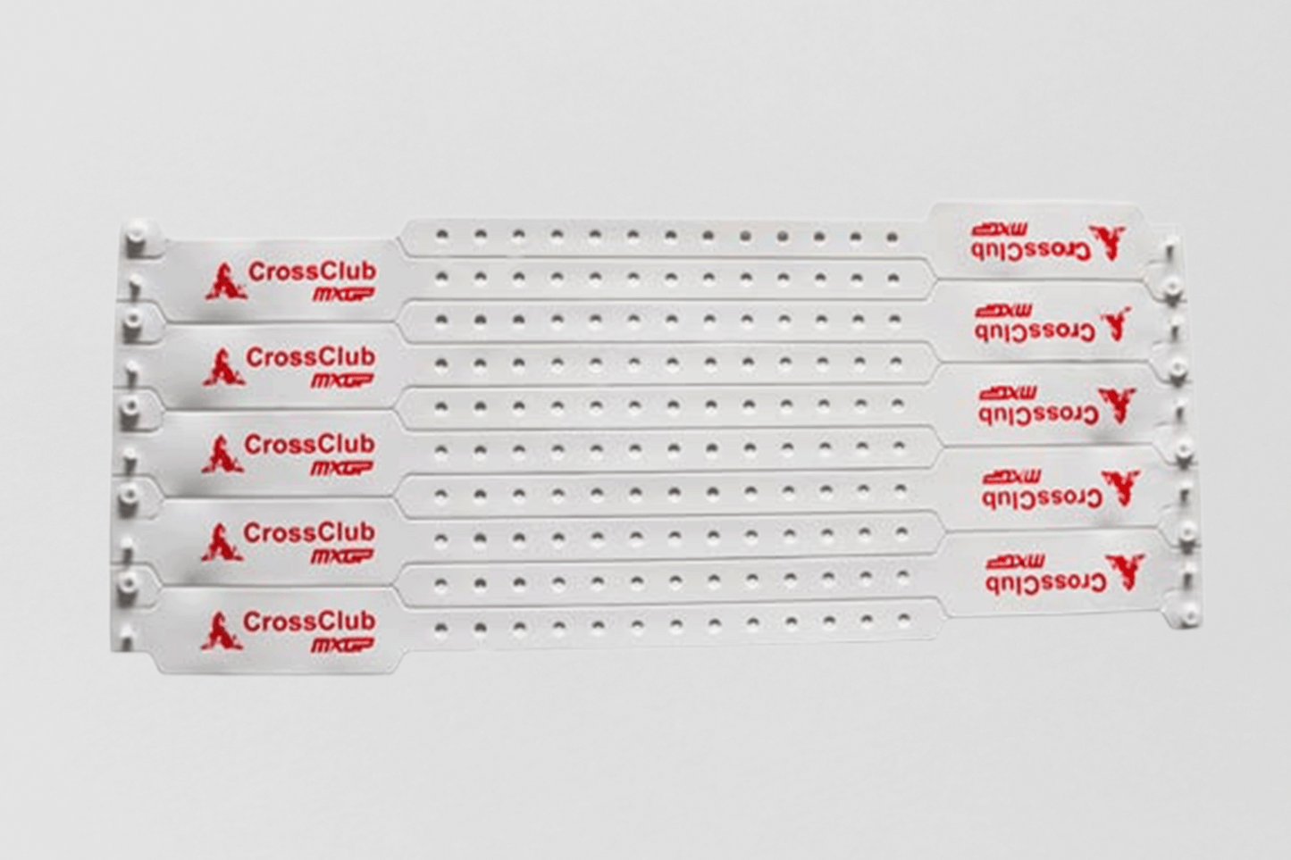 Et plastarmbånd med fem knagger på laget av PVC-plast, av JM Band®.