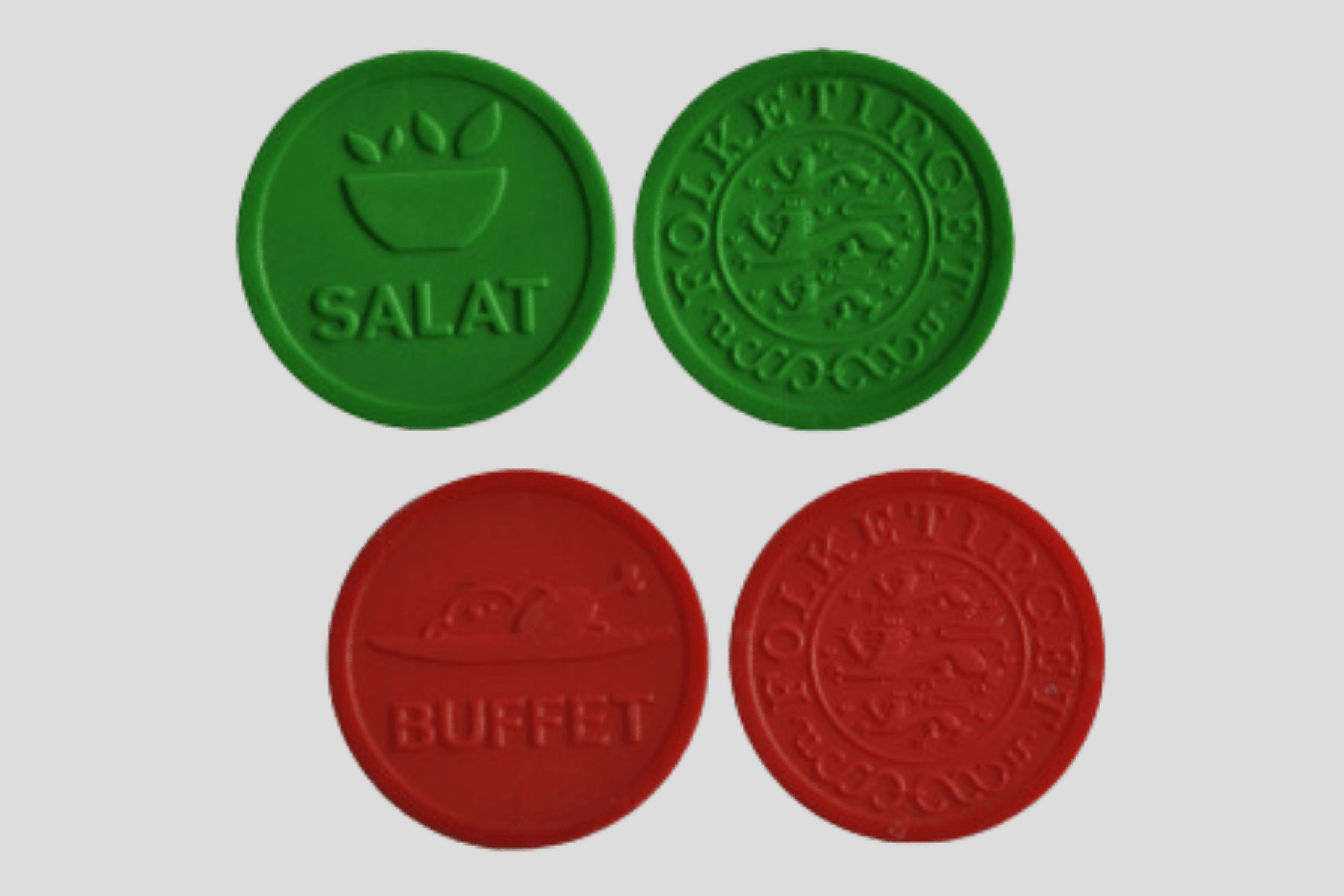 Et sett med grønne, røde og grønne frimerker.