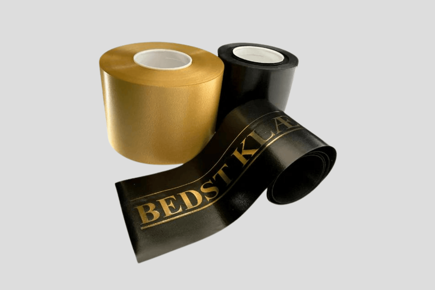 En rull Ordensbånd trykk Via e-posttape med ordet bedstick på, fra JM Band®.