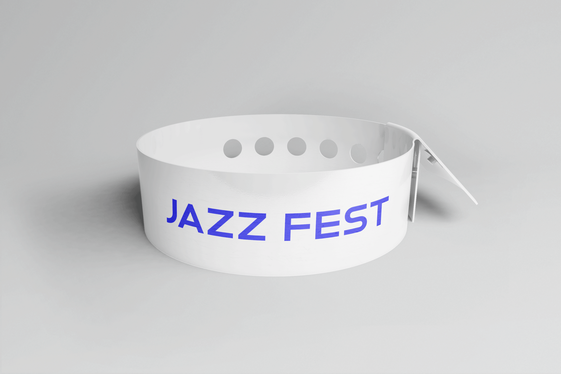 Et hvitt Plastarmbånd L-print Design selv med ordet jazzfest på, laget av JM Band NO.