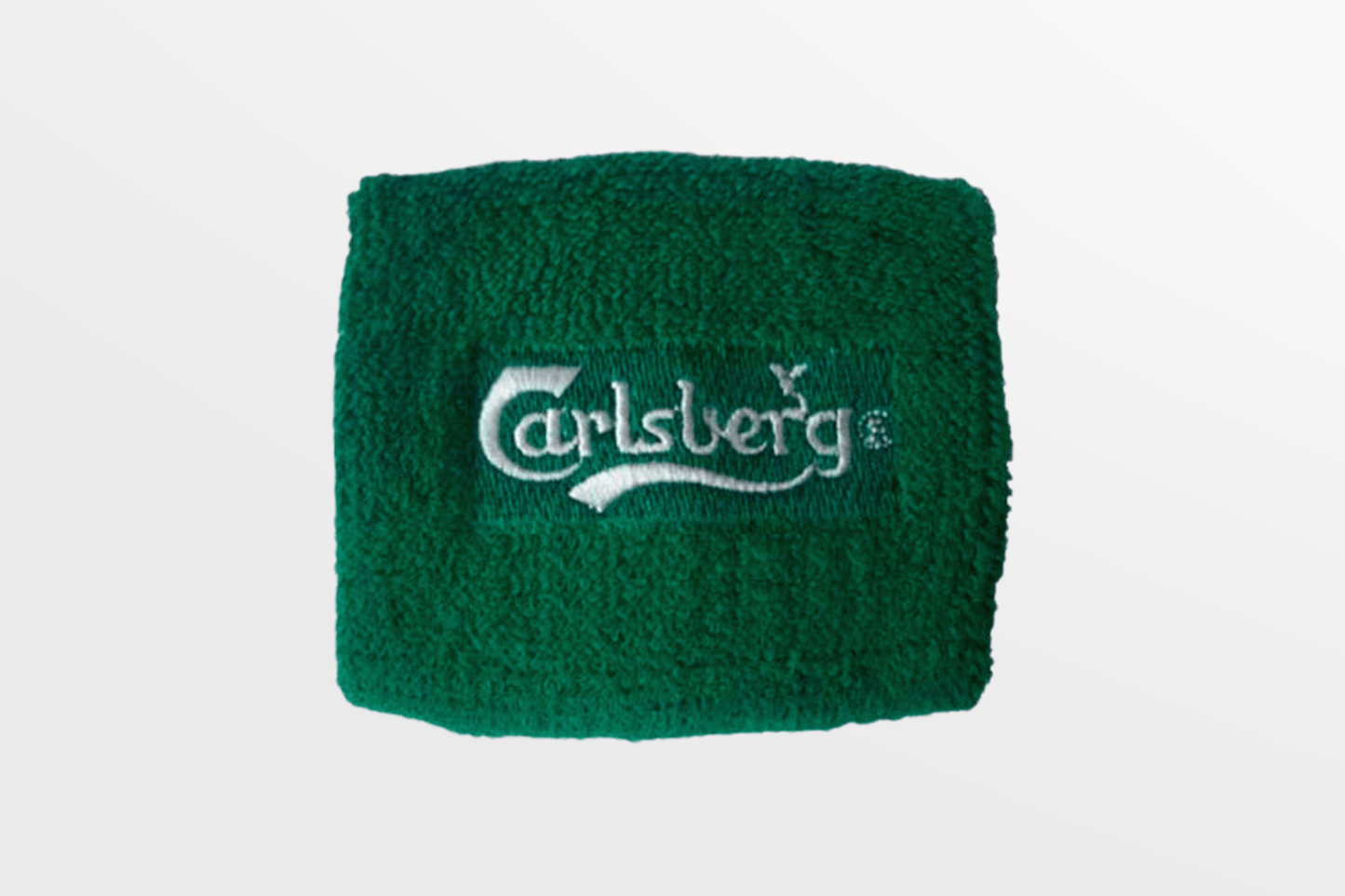 Et Svettearmbånd brodert Via e-post med ordet JM Band® på.