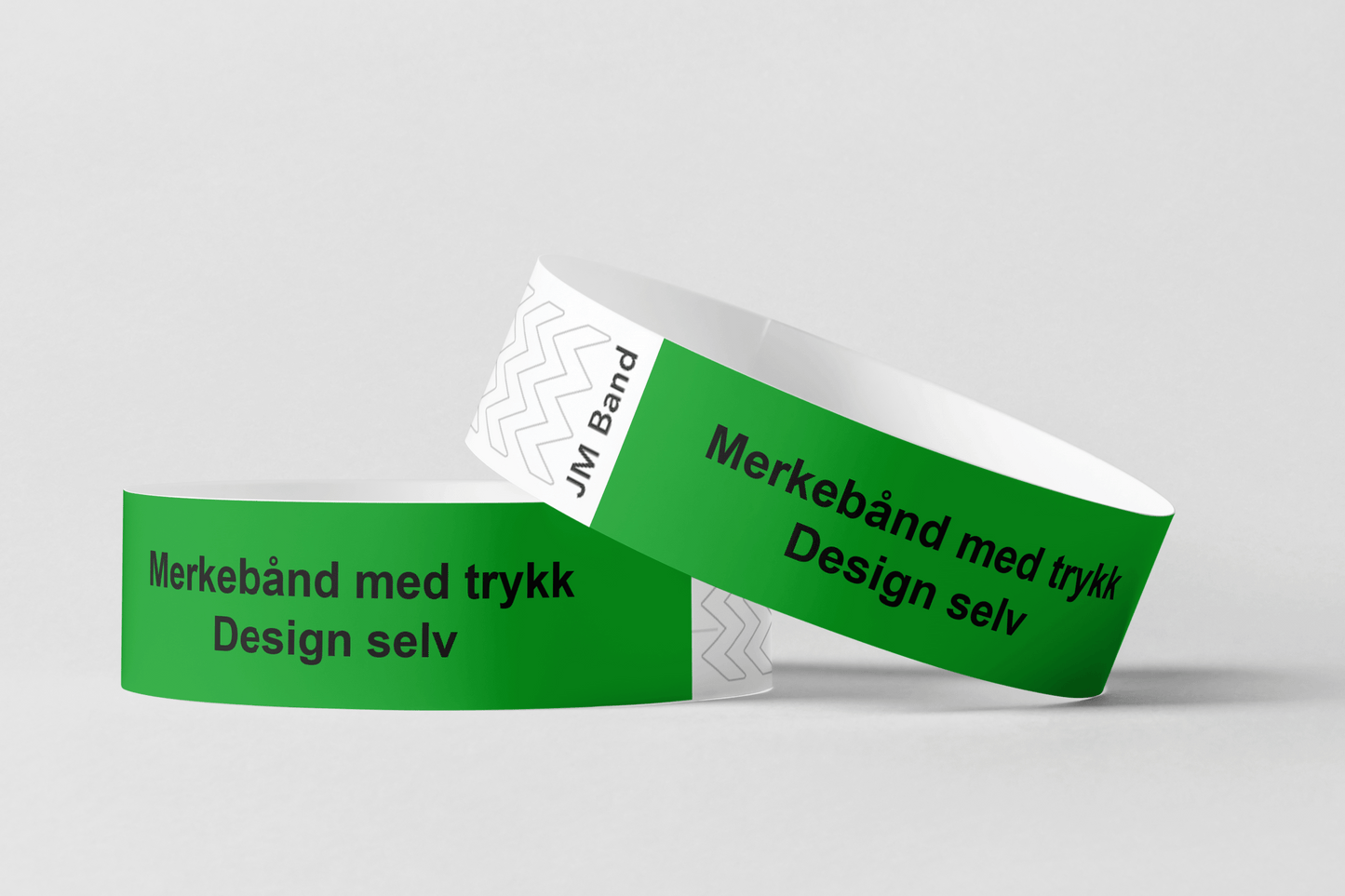 To grønne JM Band NO armbånd med ordene Merking av kassetttrykk Design selv.