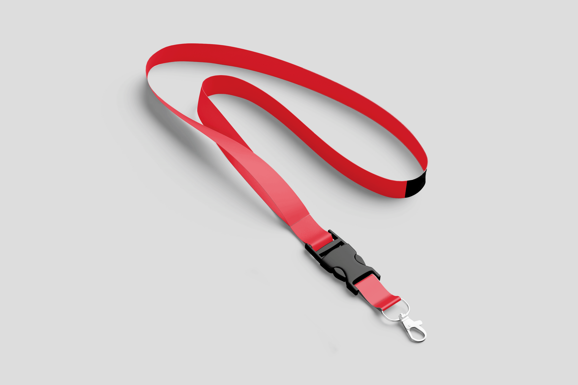 Et rødt JM Band NO nøkkelbånd polyester farger På lager på grå bakgrunn.
