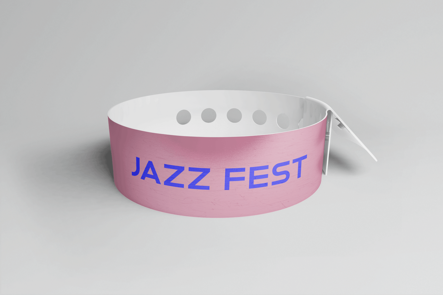 Et rosa Plastarmbånd L-print Design selv armbånd med ordene "jazz fest" på, perfekt for rask produksjon og laget av slitesterk plast, av JM Band NO.