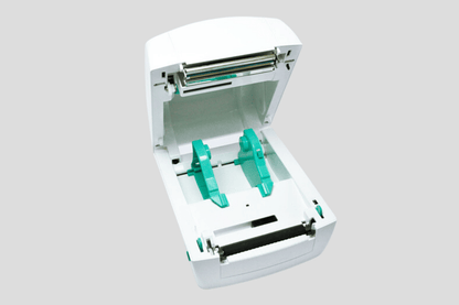 En hvit boks med grønt lokk og grønt håndtak som benytter Trykksystem JMB4+ teknologi fra JM Band NO.