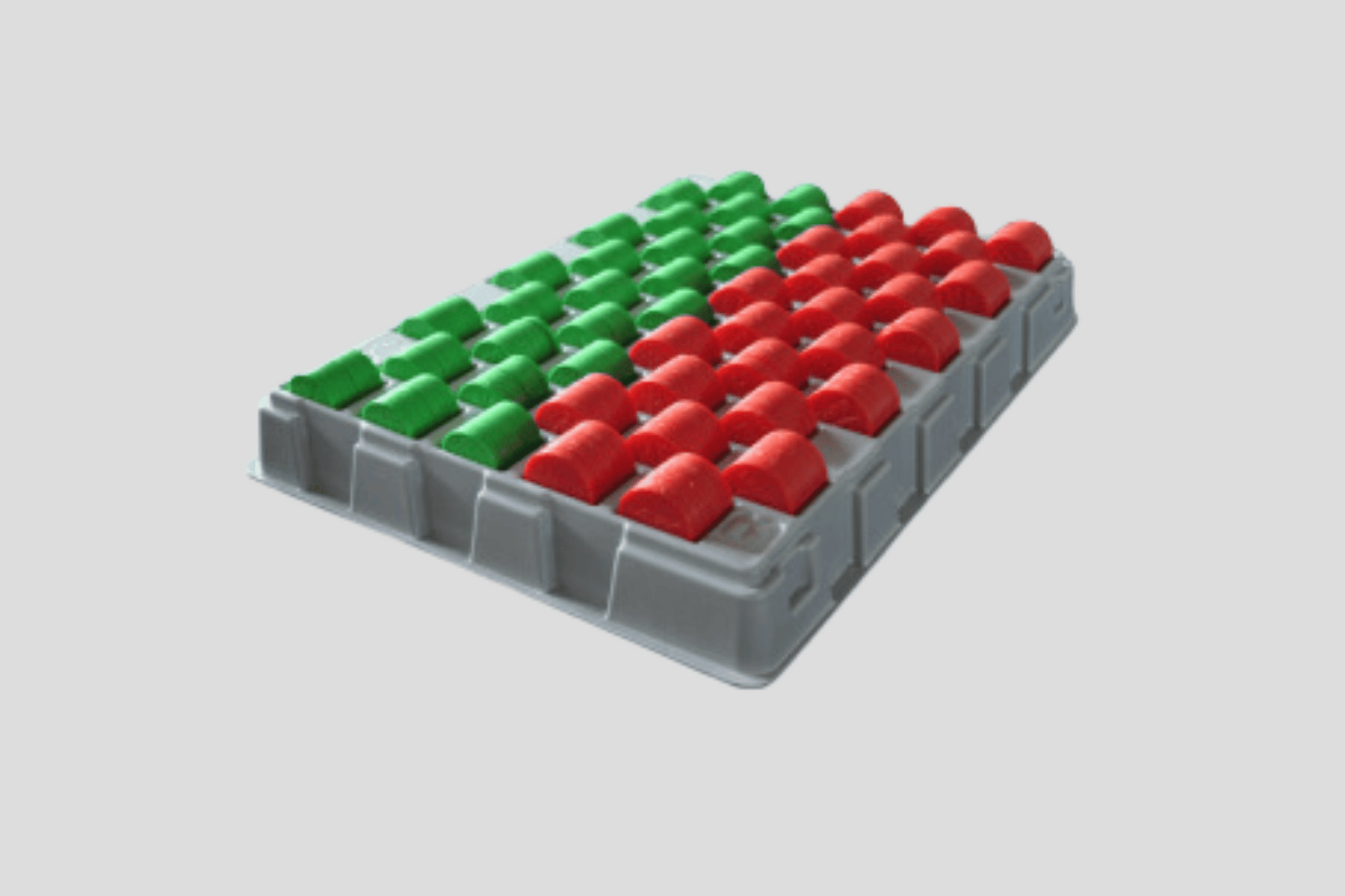 Et JM Band NO plastbrett for sortering av Poletter tellebakke På lager polletter med grønne og røde firkanter på.